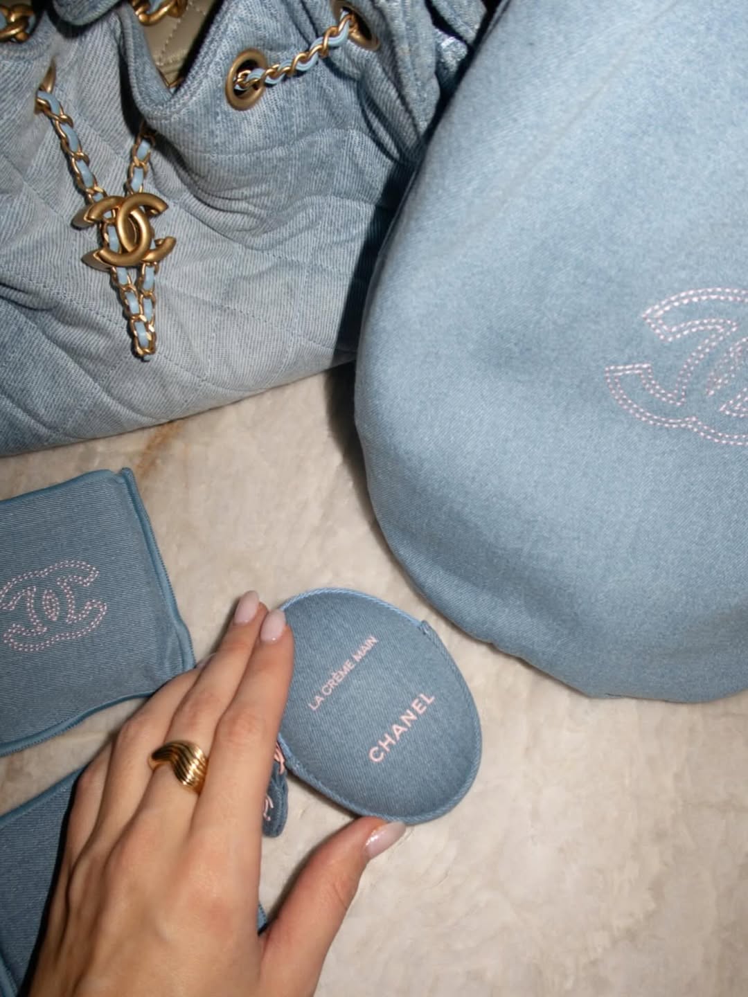 Chanel Pre-Fall 2020 Beige 31 Rue Cambon Sweater with Black Floral